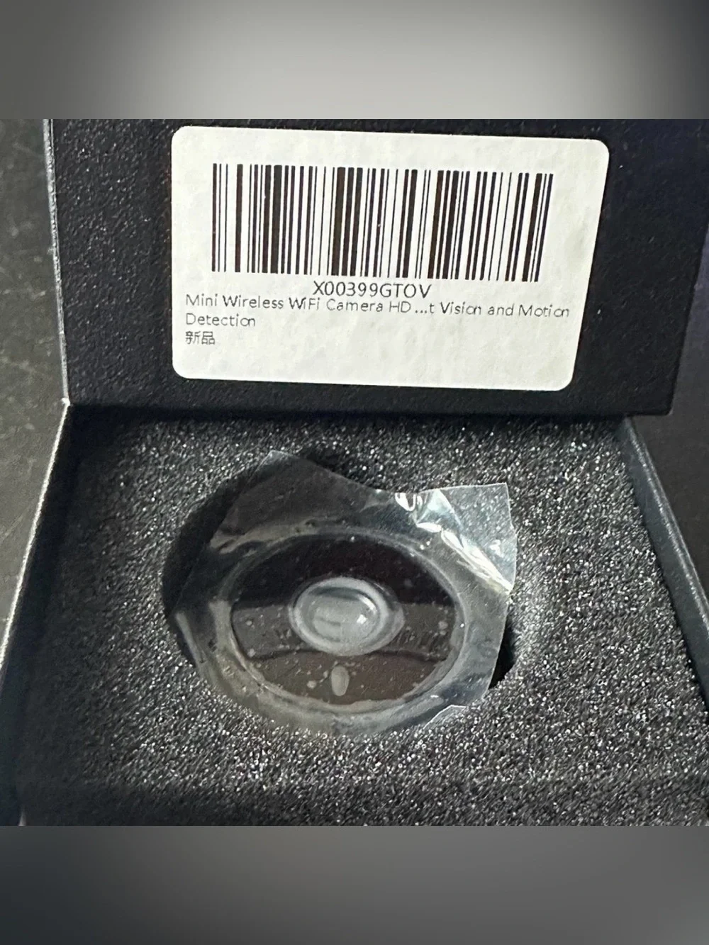 Compact Black WiFi Security Camera with USB Cable